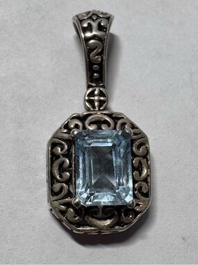 Sterling Silver Emerald Cut Blue Topaz Set in Oxidized Filigree Pendant